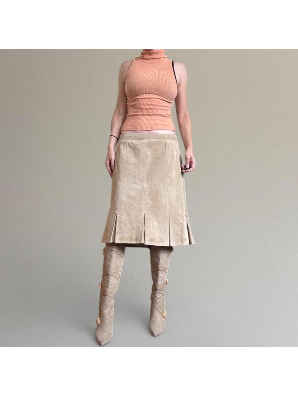 Tan suede pleated midi skirt.